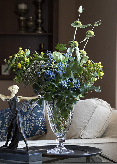 floral arangement with mahonia berries