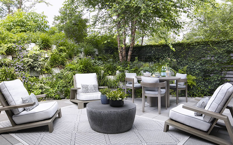 outdoor living space with floor and rug