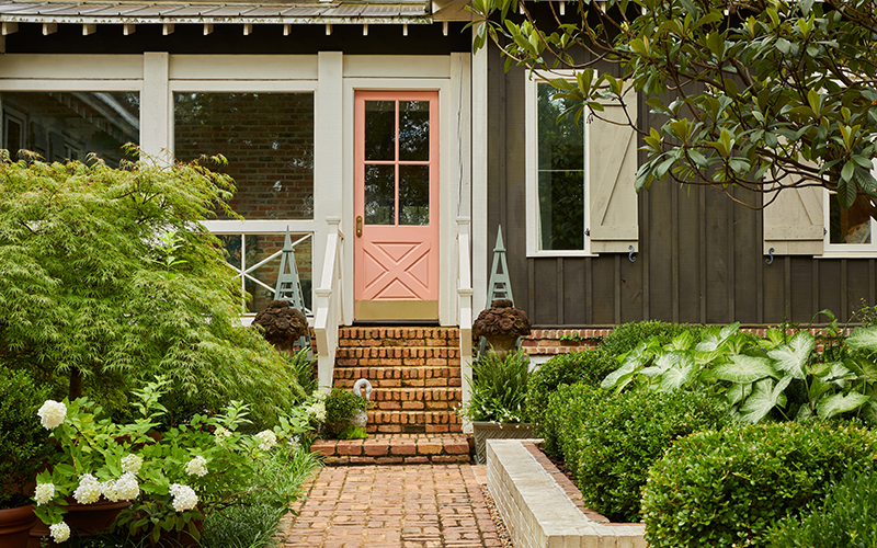 pink door in romantic garden